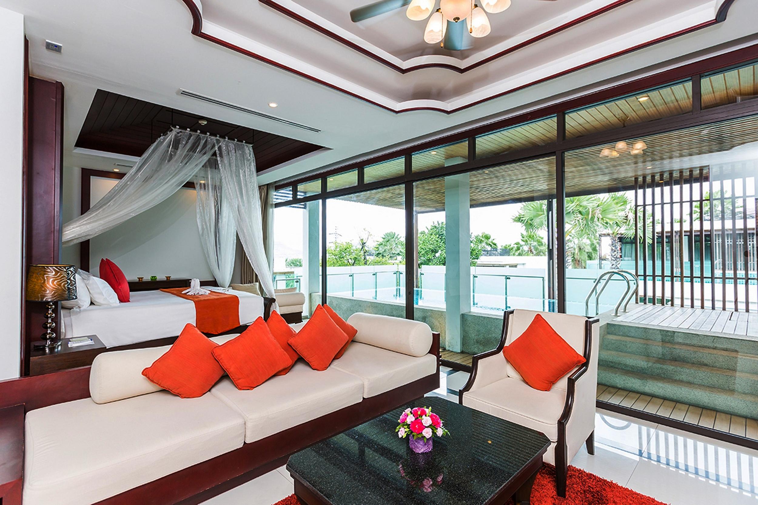 Wyndham Sea Pearl Resort, Phuket Patong Bagian luar foto A bedroom at the Royal River Boutique Hotel